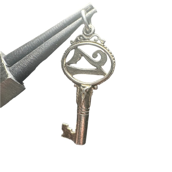 Jewelry - Vintage Sterling silver 21 charm!